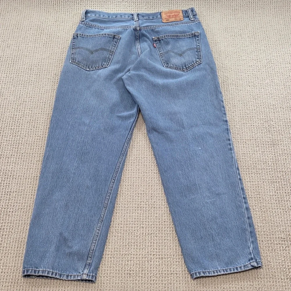 Vintage Levis 550 Relaxed Fit Blue Jeans Light Wash Denim Distressed Mens‎ 34x30